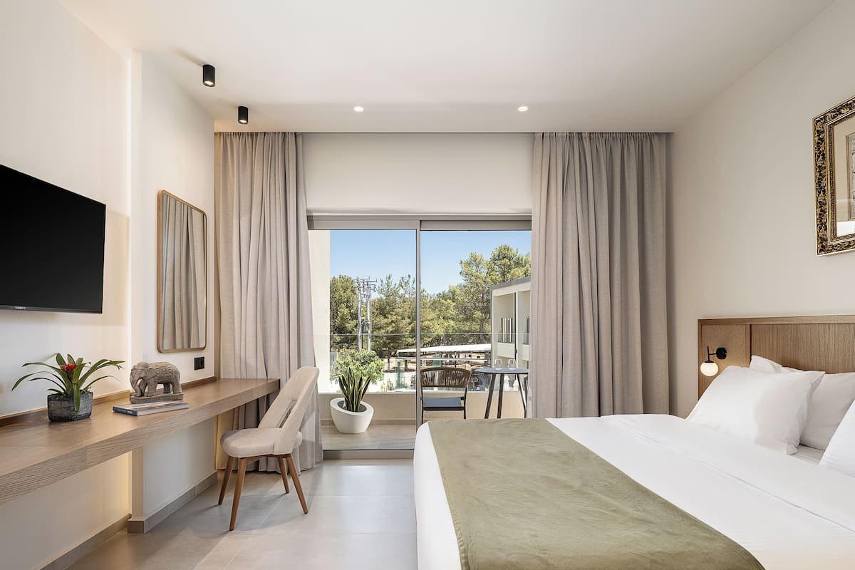 Classic Suite with Pool view | 1 bedroom, hypo-allergenic bedding, in-room safe, soundproofing