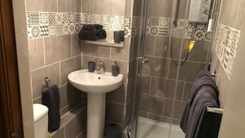 Hair dryer, towels, soap, toilet paper