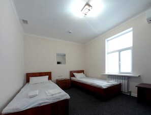 Economy Room | Premium bedding, desk, free WiFi, bed sheets - Railway hotel (Almaty)