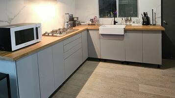 Shared fridge, microwave, dining tables