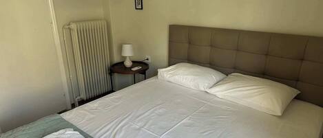 2 dormitorios, tabla de planchar con plancha, wifi y ropa de cama