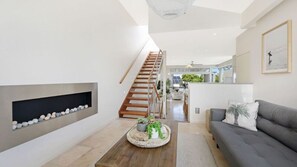 TV, fireplace, books, stereo