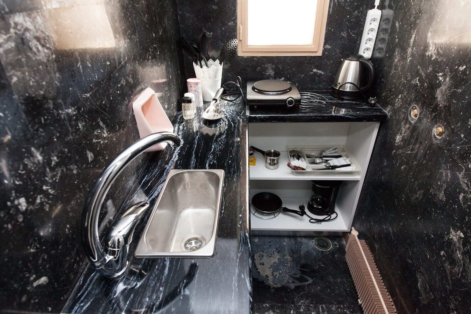 Apartamento | Cocina privada | Frigorífico grande, horno, tostadora y utensilios de cocina