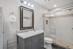Bathtub, hair dryer, shampoo