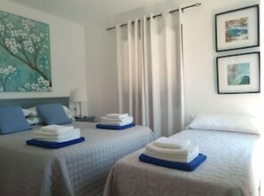 2 slaapkamers, een strijkplank/strijkijzer, gratis wifi, beddengoed