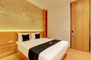 Habitación Deluxe doble | Espacio para trabajar con un portátil, wifi gratis, ropa de cama