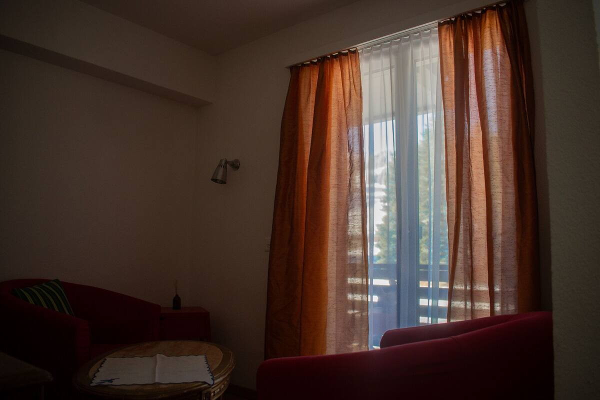 Comfort Double Room, 1 Double Bed | Living area | 32-inch flat-screen TV with digital channels