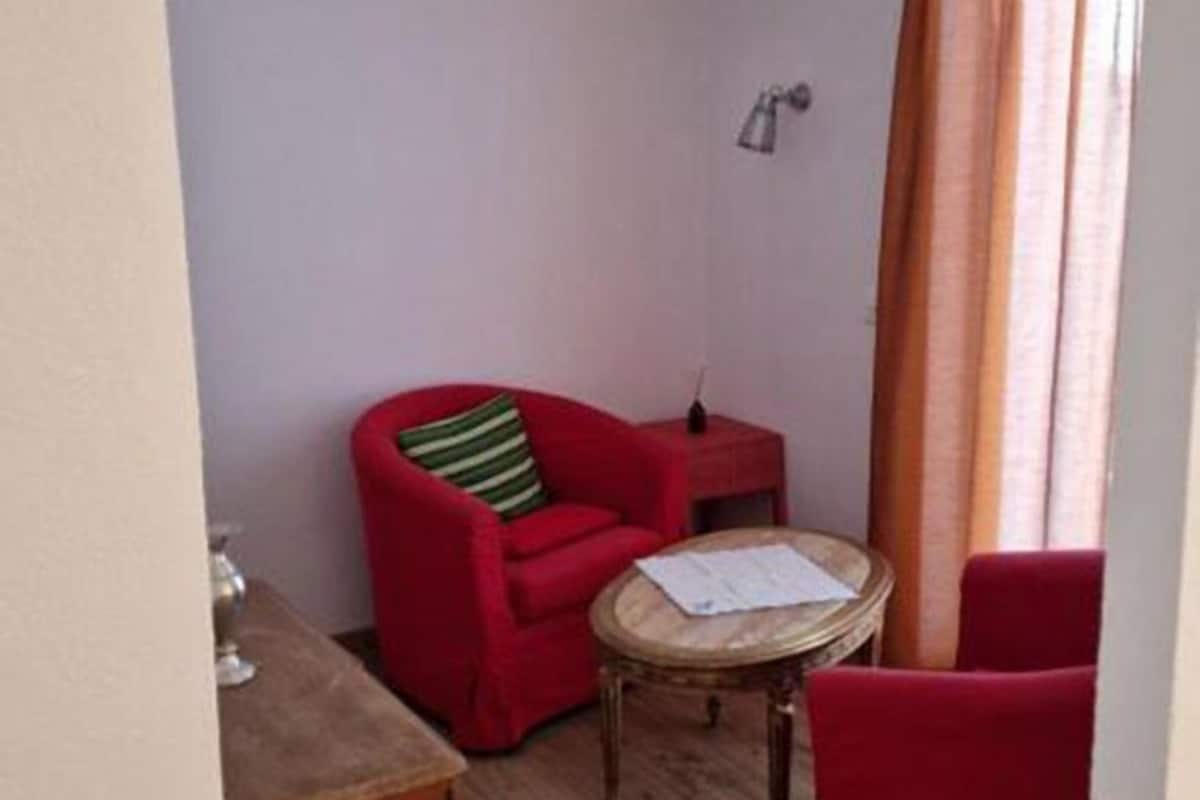 Comfort Double Room, 1 Double Bed | Living area | 32-inch flat-screen TV with digital channels