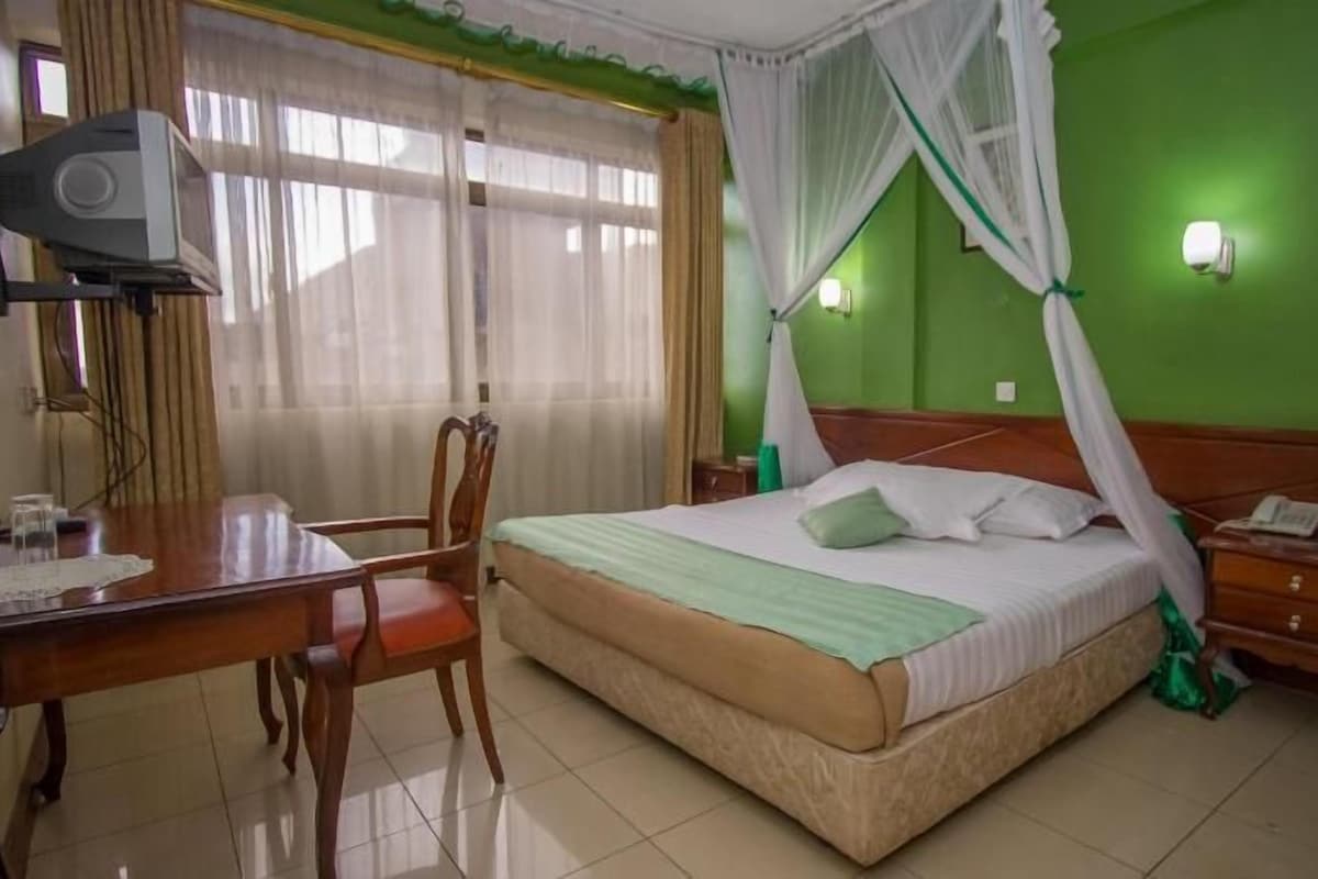 Premium bedding, memory foam beds, desk, laptop workspace