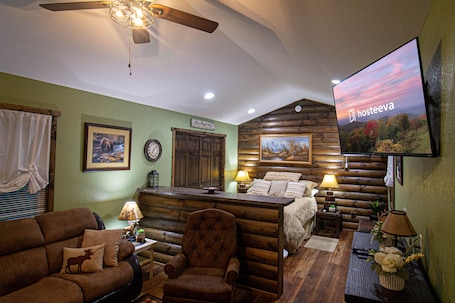 Comfort Cabin, Fireplace, Mountain View | Living room | 60-inch flat-screen TV with satellite channels, fireplace