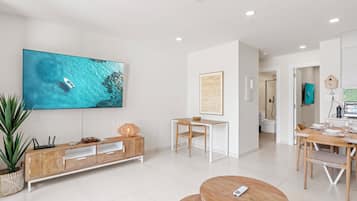 Appartement Premium | Coin séjour | TV connectée