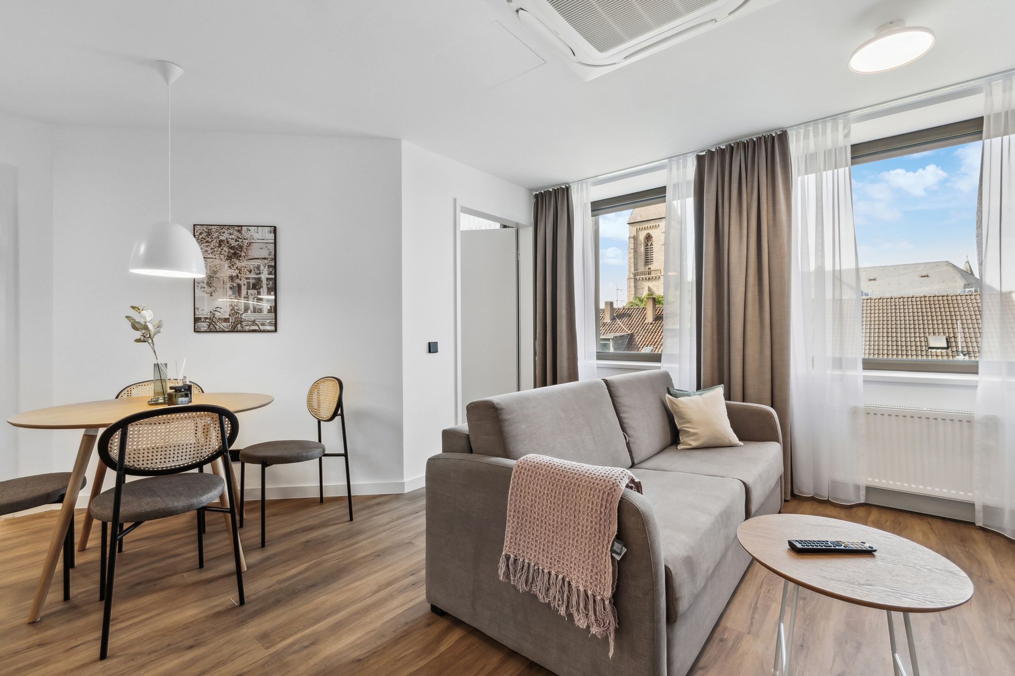 One-Bedroom Suite | Living area | 50-inch flat-screen TV with satellite channels