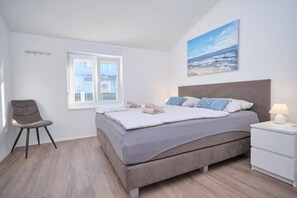 2 slaapkamers, een strijkplank/strijkijzer, gratis wifi, beddengoed