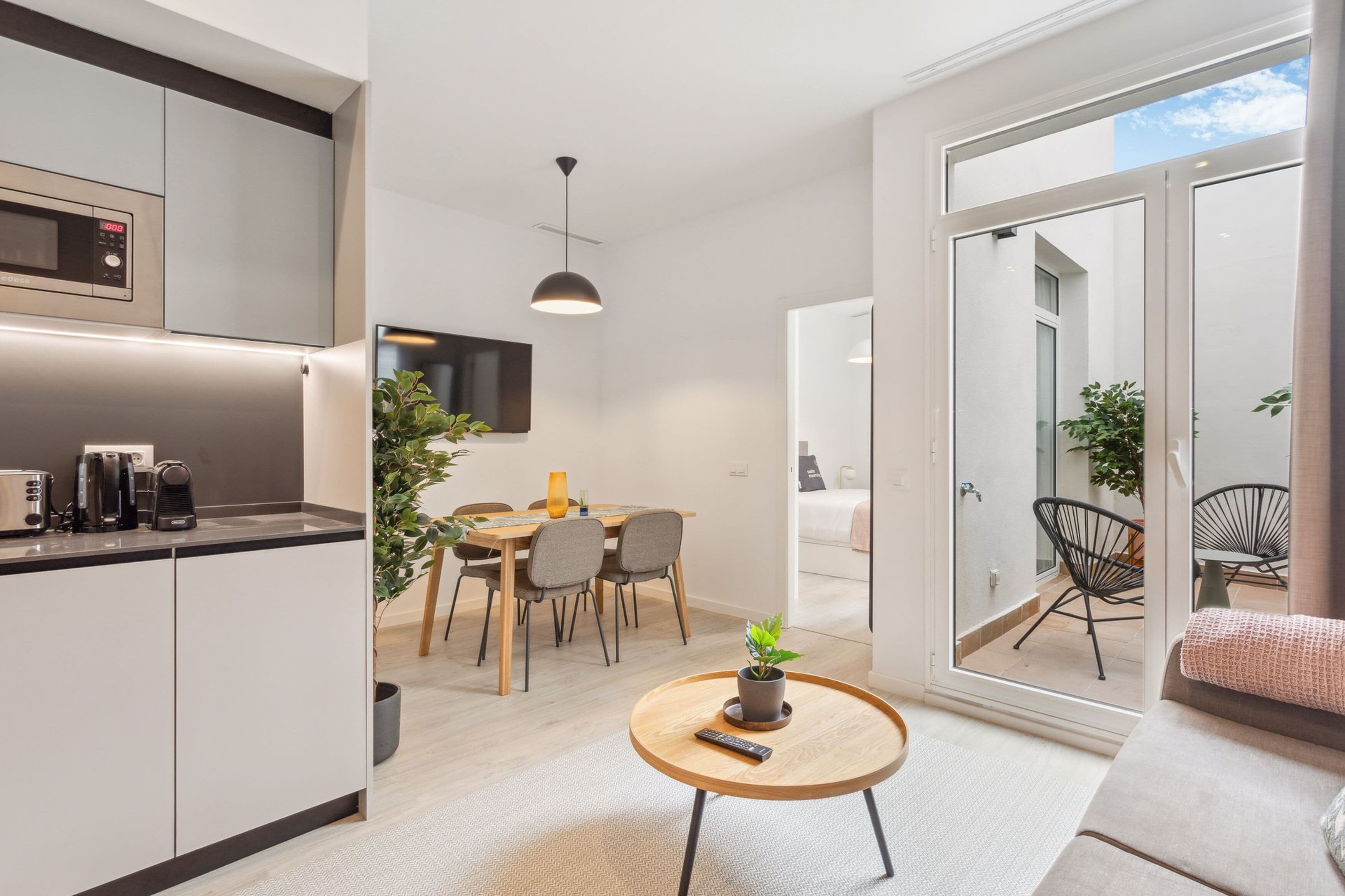 One-Bedroom Apartment with terrace | Living area | 50-inch flat-screen TV with satellite channels