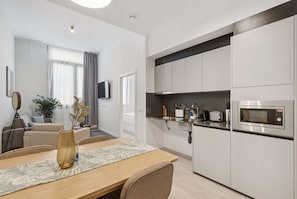 1-Bedroom Apt Ground Floor - Disability | Private kitchen | Fridge, microwave, stovetop, dishwasher