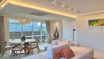 Apartamento | Área de estar | TV de tela plana