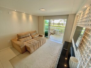 Appartement Design | Aire de séjour | Téléviseur à écran plat