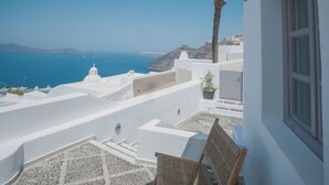 Deluxe Suite with Indoor Hot Tub and Caldera View | Terrace/patio - Anemos Family Suites (Santorini)