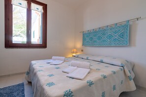 2 dormitorios, tabla de planchar con plancha, cuna de viaje y wifi