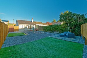 Terrace/patio - A cosy but modern bungalow with large secured & private garden. (Halifax)