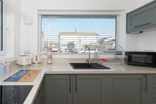 A cosy but modern bungalow with large secured & private garden.