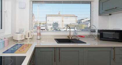 A cosy but modern bungalow with large secured & private garden.