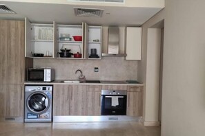 Condo | Private kitchen | Full-size fridge, microwave, oven, stovetop