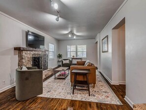 Smart TV, fireplace, foosball