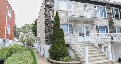 À 5 minutes de Montréal! Beaux et chaleureux 51/2 avec salle familiale sous sol.