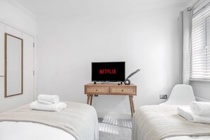 Apartamento básico | 2 quartos, ferros/tábuas de passar roupa, roupa de cama