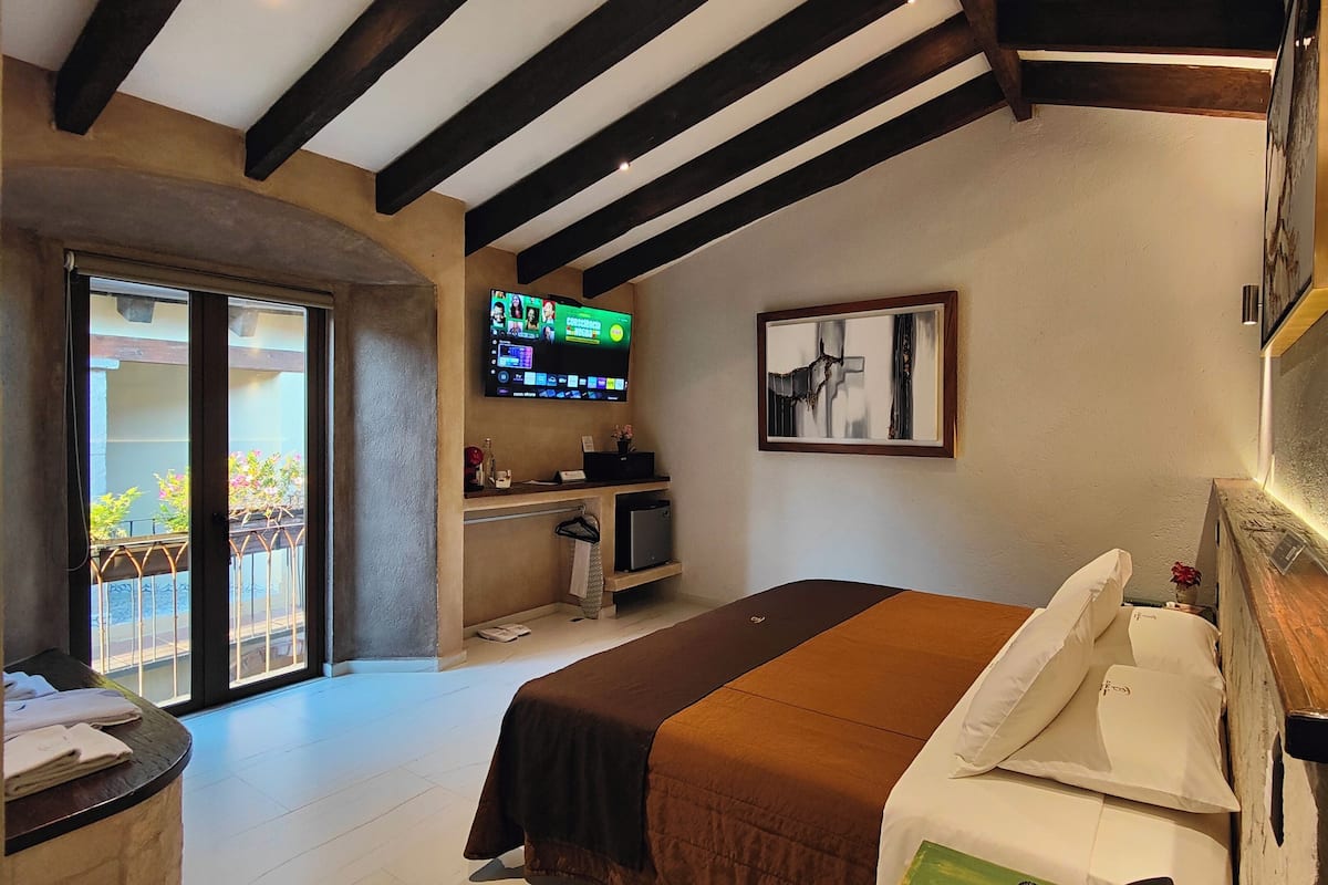 Deluxe studio suite, 1 kingsize bed, balkon, uitzicht op resort | Individueel gedecoreerd, individueel gemeubileerd