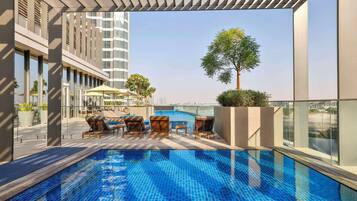 Outdoor pool, pool umbrellas, pool loungers