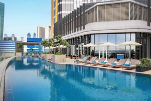 Outdoor pool, pool umbrellas, pool loungers