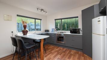 Fridge, microwave, toaster, cookware/dishes/utensils