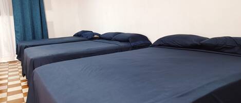 Standard Triple Room, Mixed Dorm | Blackout drapes, iron/ironing board, free WiFi, bed sheets