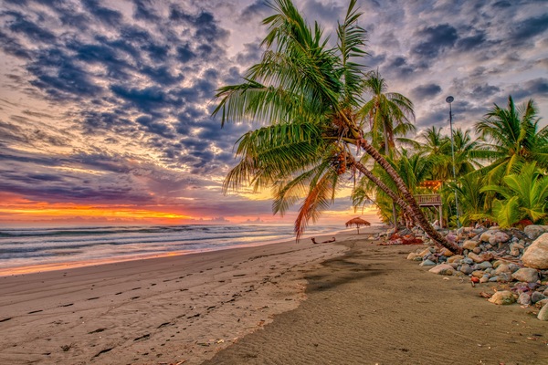 On the beach, black sand, surfing