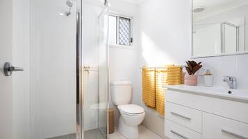 Shower, hair dryer, soap, shampoo