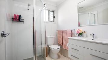 Shower, hair dryer, towels, soap