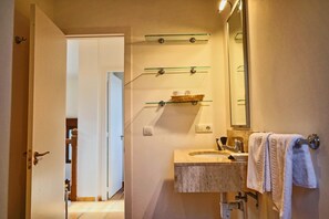 Hair dryer, towels, soap, toilet paper