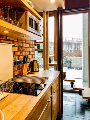 Fridge, microwave, electric kettle, cookware/dishes/utensils