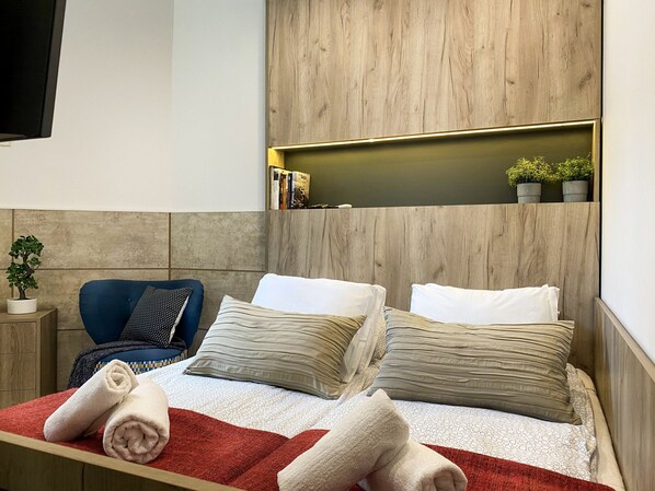 مكواة/لوح كي وواي فاي مجانًا وملاءات أسرّة