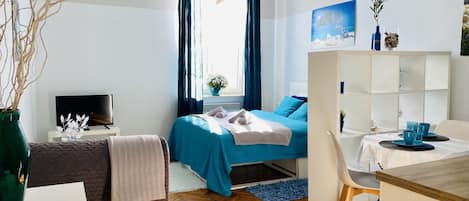 Tabla de planchar con plancha, wifi gratis, ropa de cama