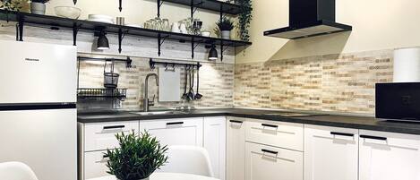 Fridge, microwave, stovetop, coffee/tea maker
