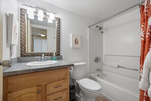 Hair dryer, towels, soap, shampoo