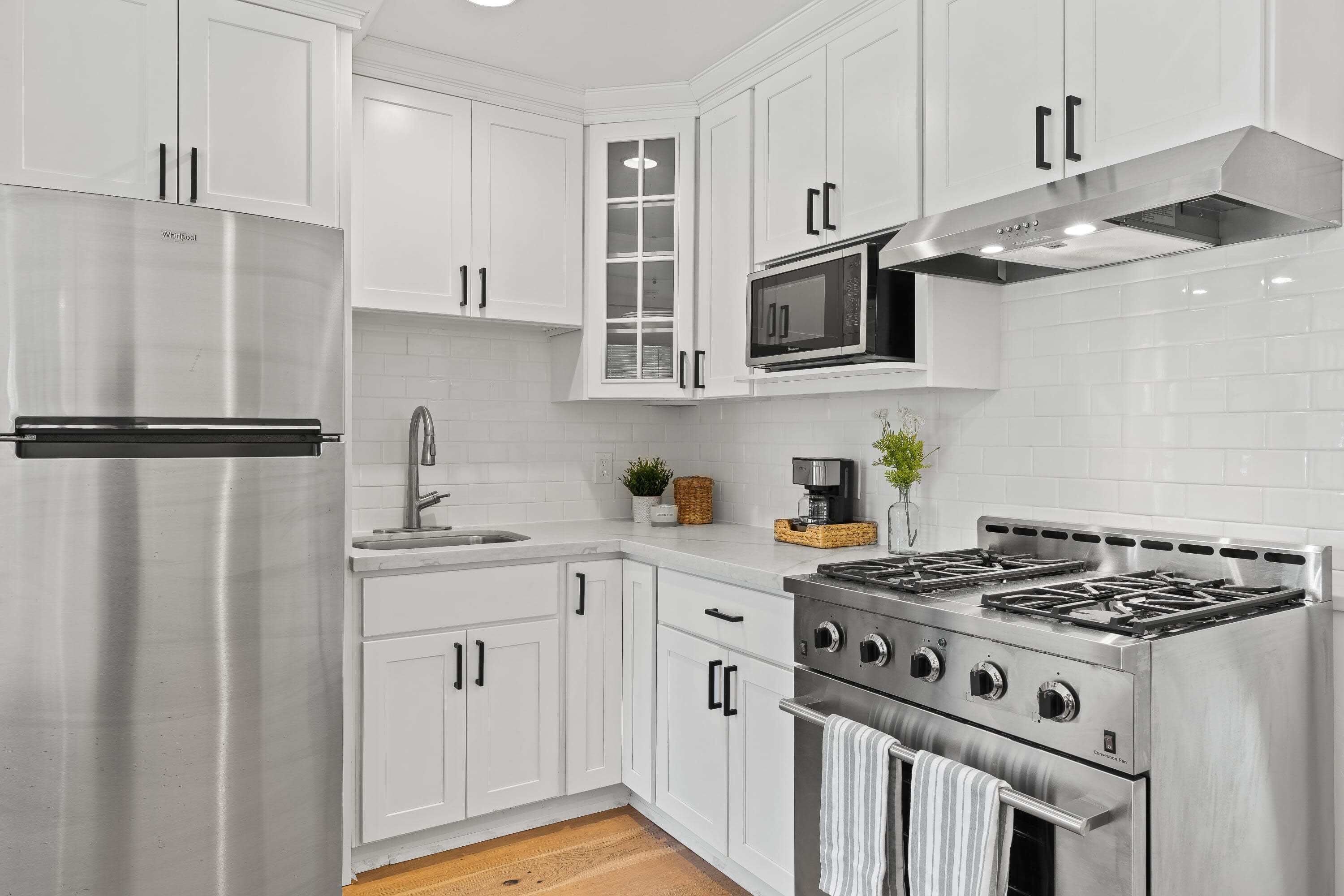 Fridge, microwave, stovetop, coffee/tea maker