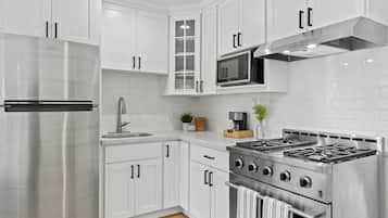Microwave, coffee/tea maker, cookware/dishes/utensils