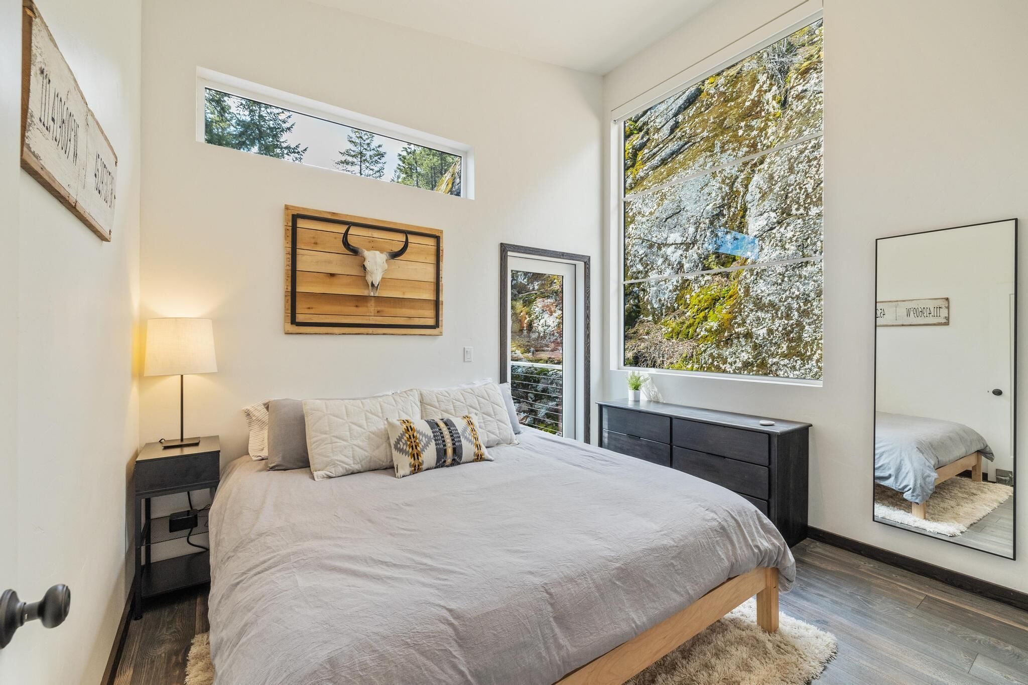Primary Bedroom | King bed, en suite bathroom, large closet and private deck. 