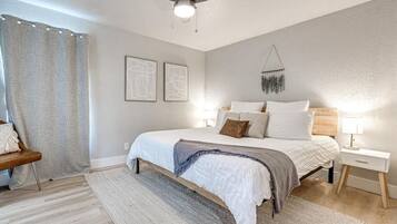 1 bedroom, desk, iron/ironing board, travel crib