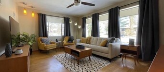 Sunny Mid-Century Modern duplex with a garage