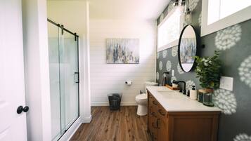 Shower, towels, soap, toilet paper